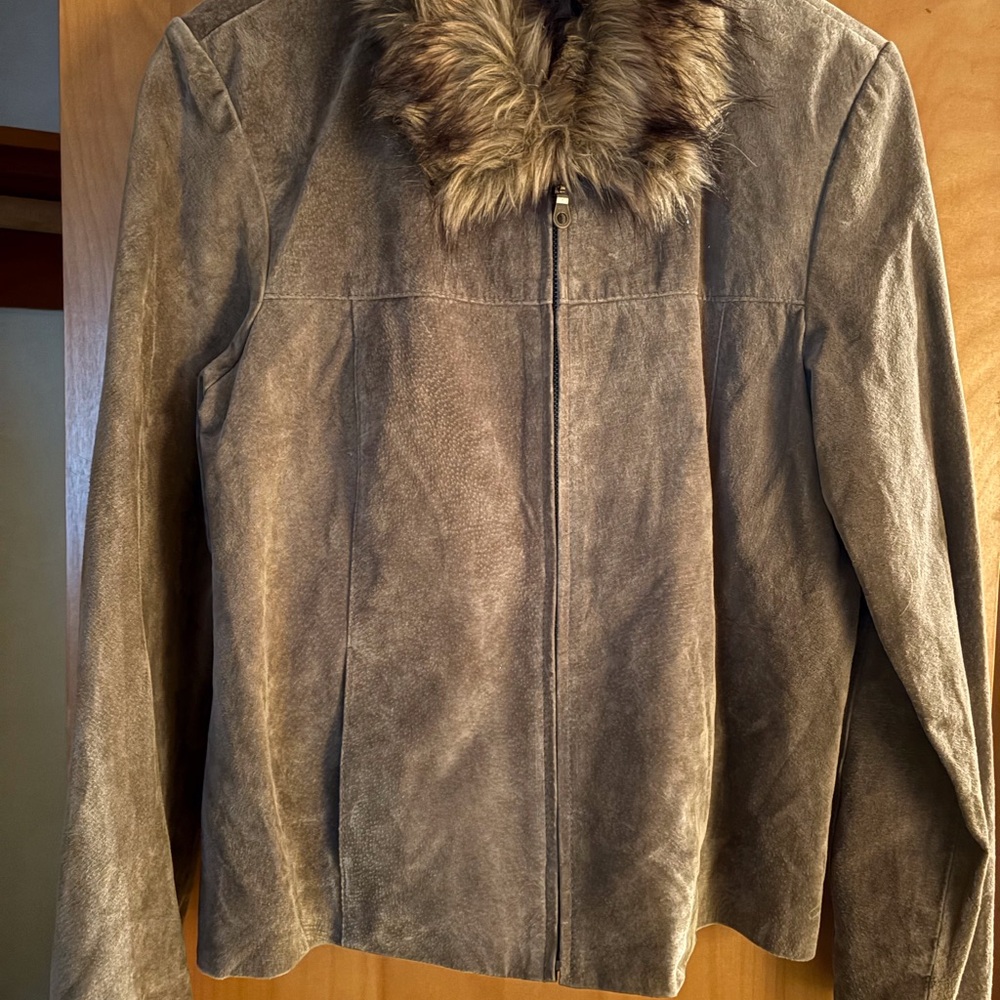 Jean Paul Richard Leather Jacket with faux fur trim.
